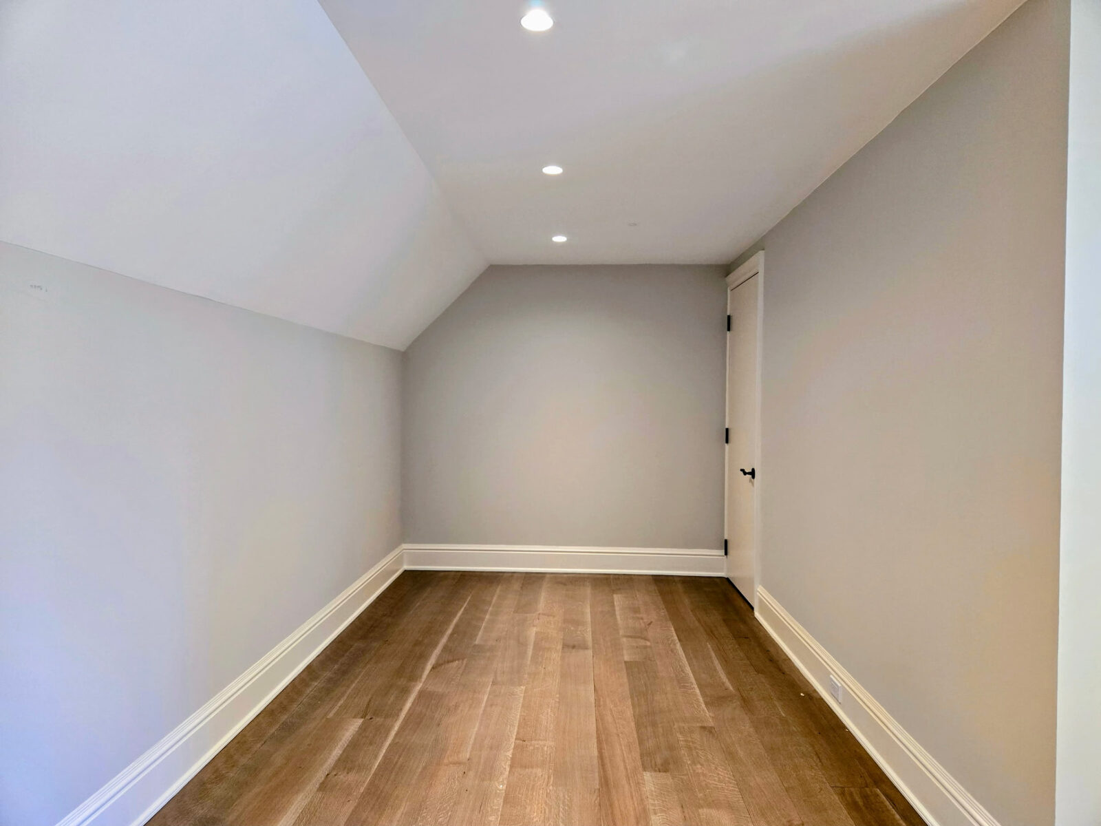 Second view of the empty space before custom walk-in closet cabinetry was built in Ridgefield CT